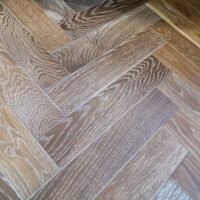 Engineered herringbone 14/4x90x450mm Smoked White FTHB1497T 1